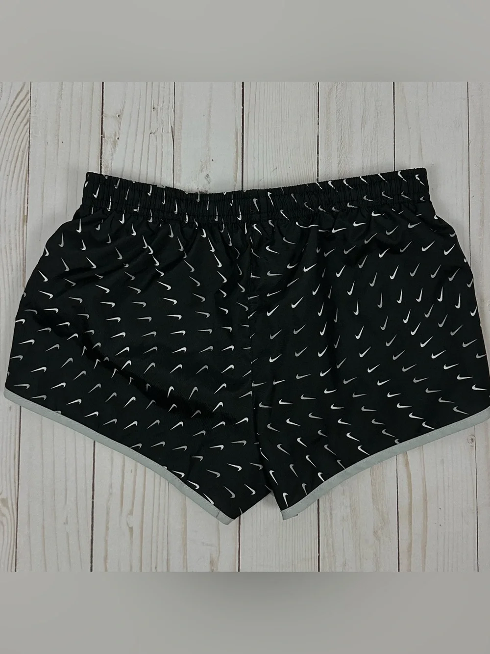 NIKE girl's Dri-Fit black & white Printed Swoosh running shorts - size small